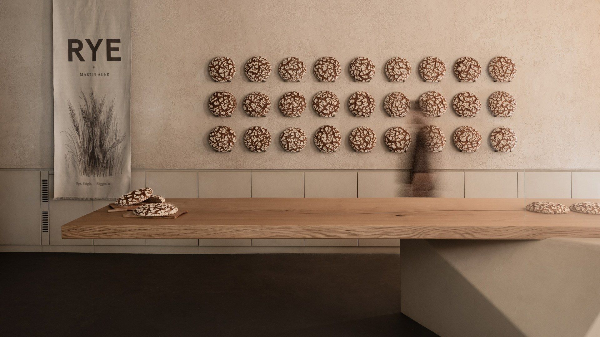 Interior photography for RYE by Martin Auer featuring the bakery wall and branded linen banner by TRUFFL branding agency
