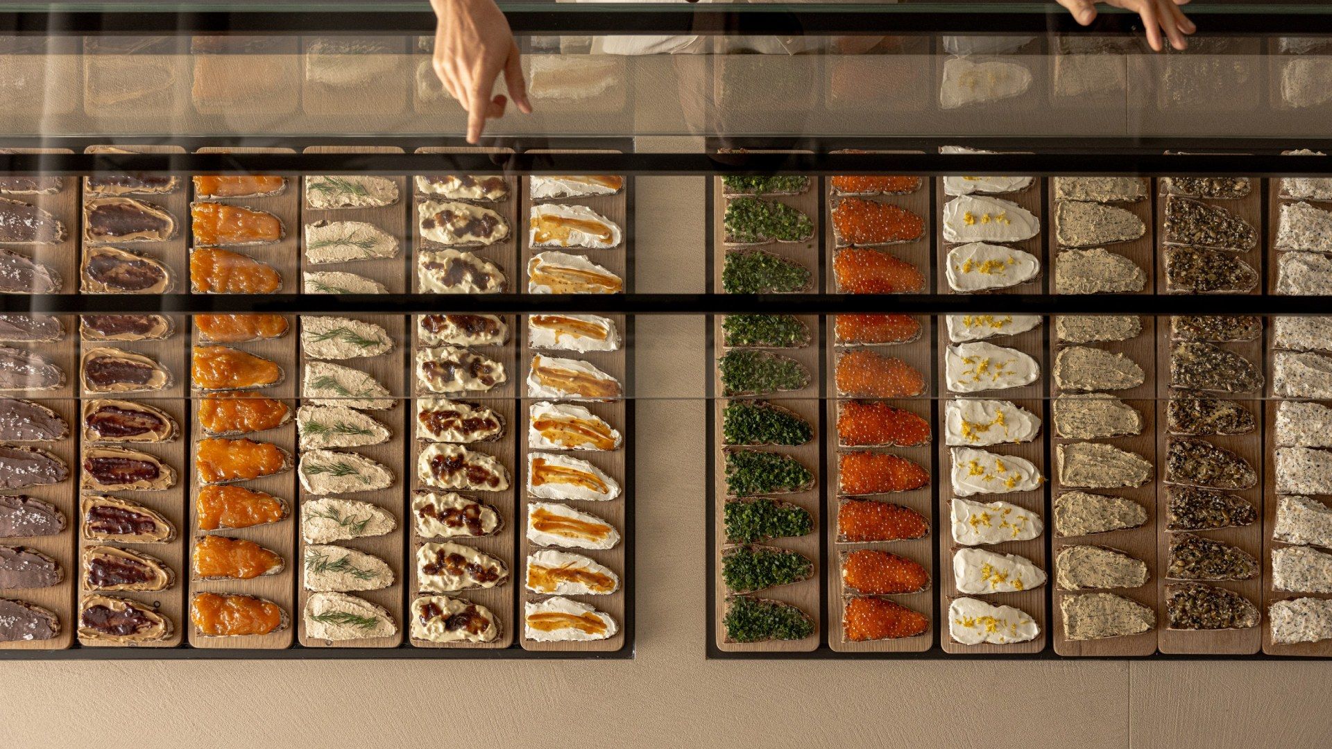 Bakery photography for RYE by Martin Auer featuring the counter from overhead by TRUFFL branding agency